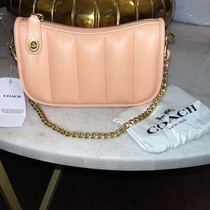 Small leather coach purse with gold chain